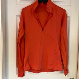Lululemon size 8 orange half zip.